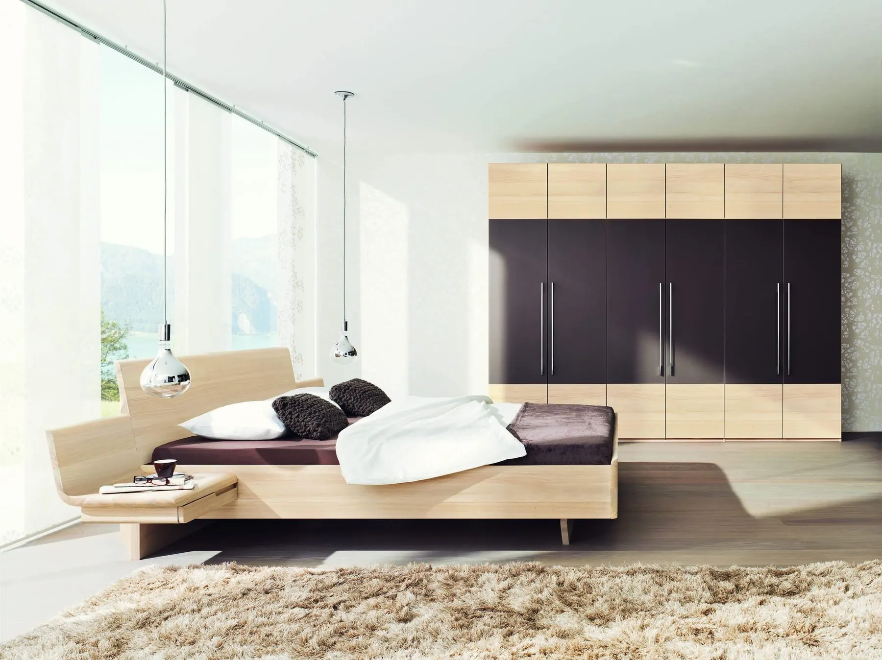 Schlafzimmer Tesso in weißer Esche mit durchgehender Schrankwand