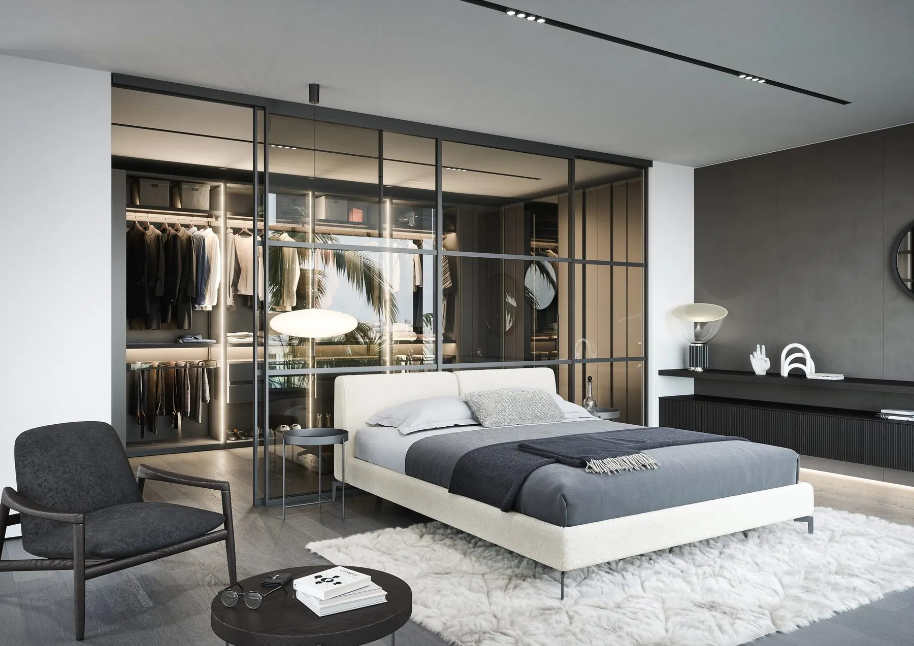 Schlafzimmer mit Bett und begehbarer Ankleide hinter Glastüren
