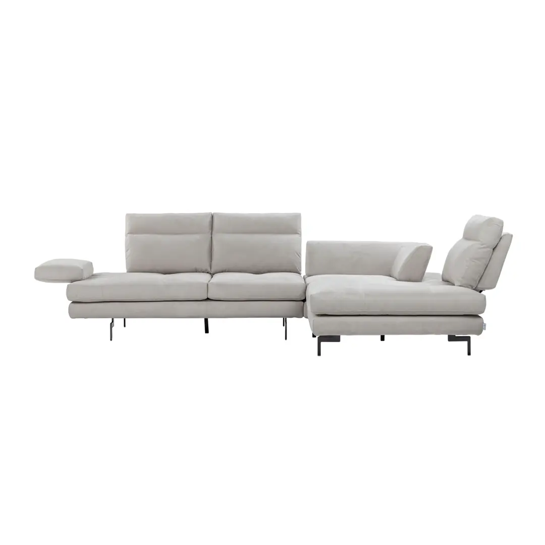 Seitliche Ansicht eines grauen Sofas Toby Wing mit geöffnetem Sitzmodul